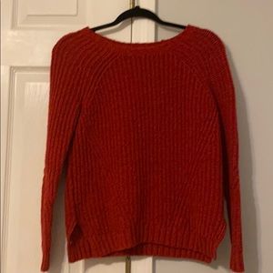 thick red sweater